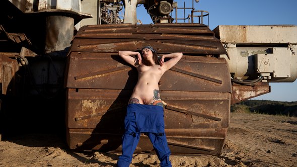 Naked babe in uniform shows her amazing curvy body