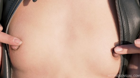 Lady in lace dress gets topless on motorbike showing off her nipples