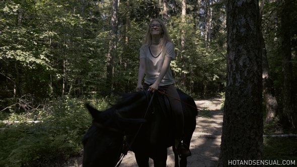 Sexy blonde with small tits bathing after riding a horse